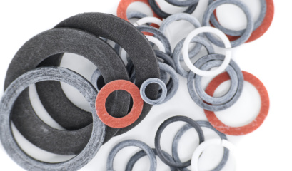 A Detailed View Showcasing An Assortment Of Rubber And Fiber Gaskets In Various Sizes And Colors.